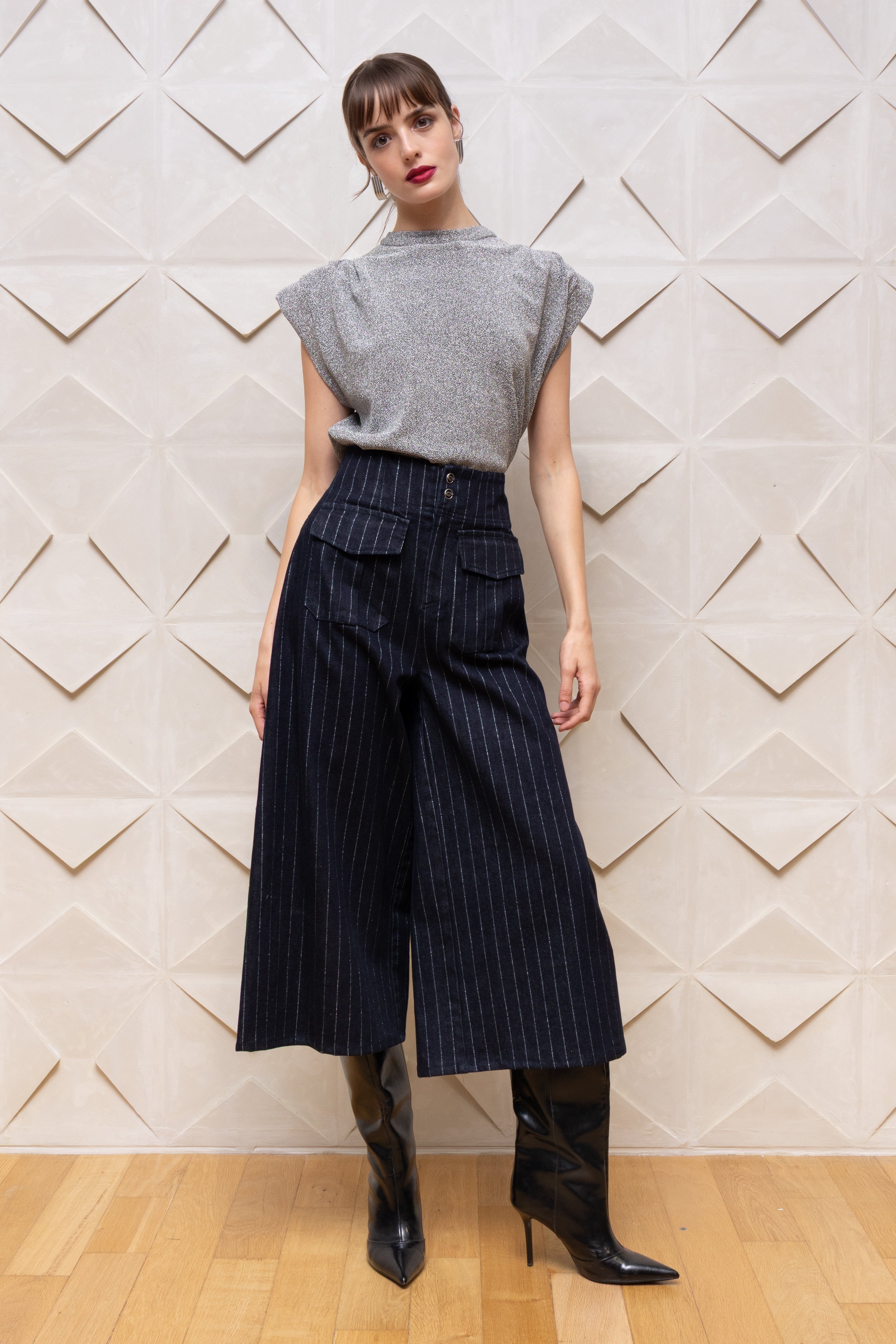 NEMA Resort Wear navy pinstripe high-waisted culotte trousers with wide cropped leg and statement front pockets.