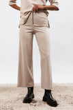 Trousers with exposed zip