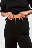 Trousers with exposed zip