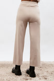 Trousers with exposed zip