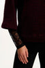 Burgundy Chevron Knit Top with Lace Sleeves – Elegant Winter Style