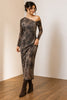 A woman models a long-sleeve off-the-shoulder midi dress with a brown and black leopard print, paired with dark brown suede boots, standing in a minimalist room with a beige wall and wooden floor.